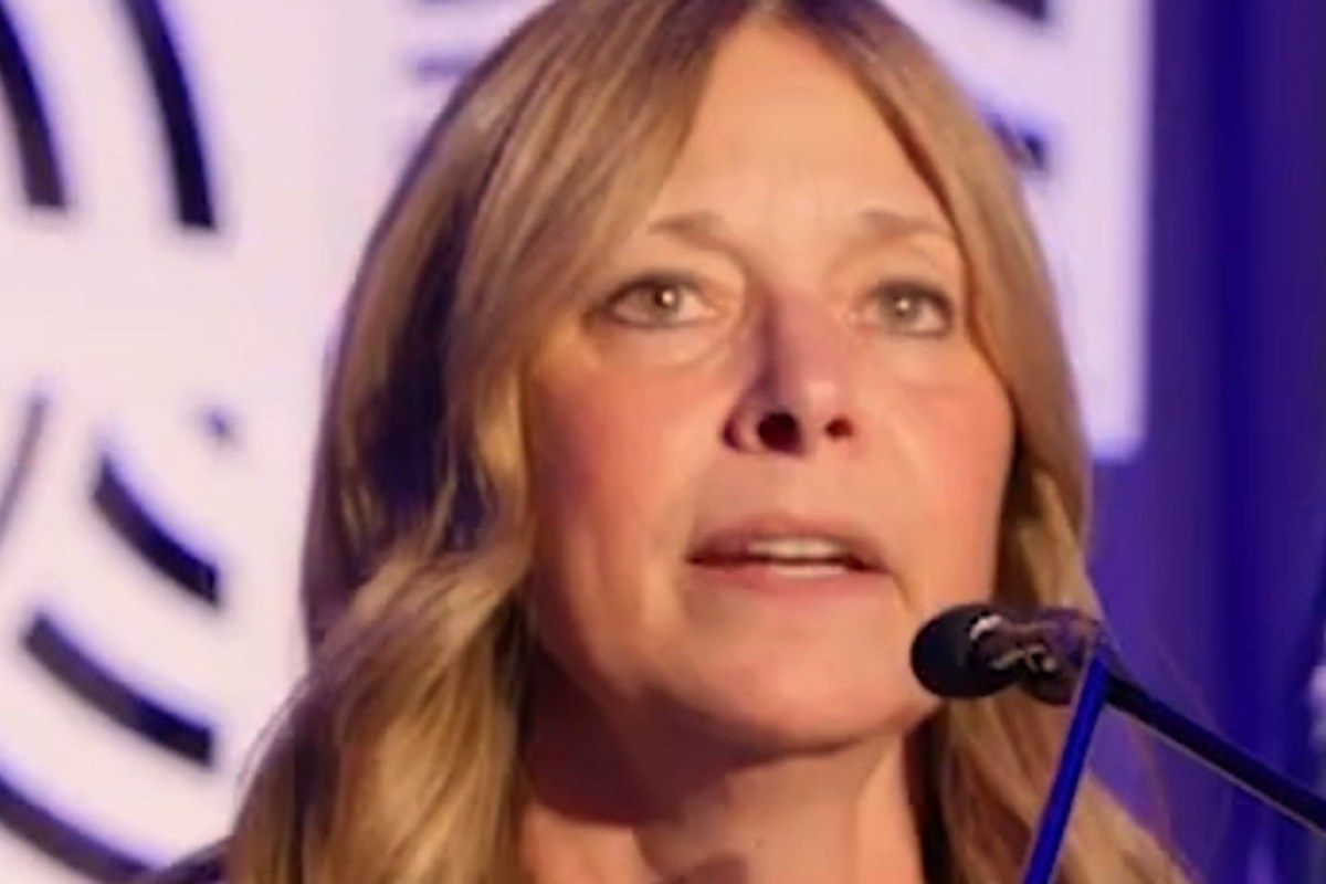 Amy Acton speaking at a lectern