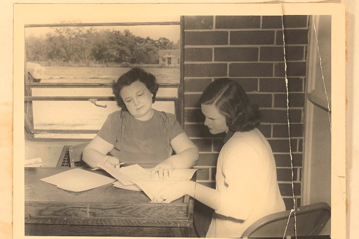 A high school guidance counselor meeting with a student in Sylvania, Georgia, 1951